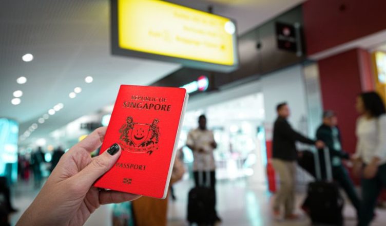Lady holding Singapore passport