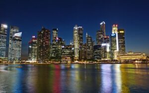 Singapore skyline at night with illuminated cityscape