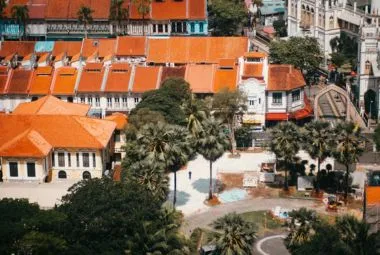 Colorful Singapore shophouses with orange roofs